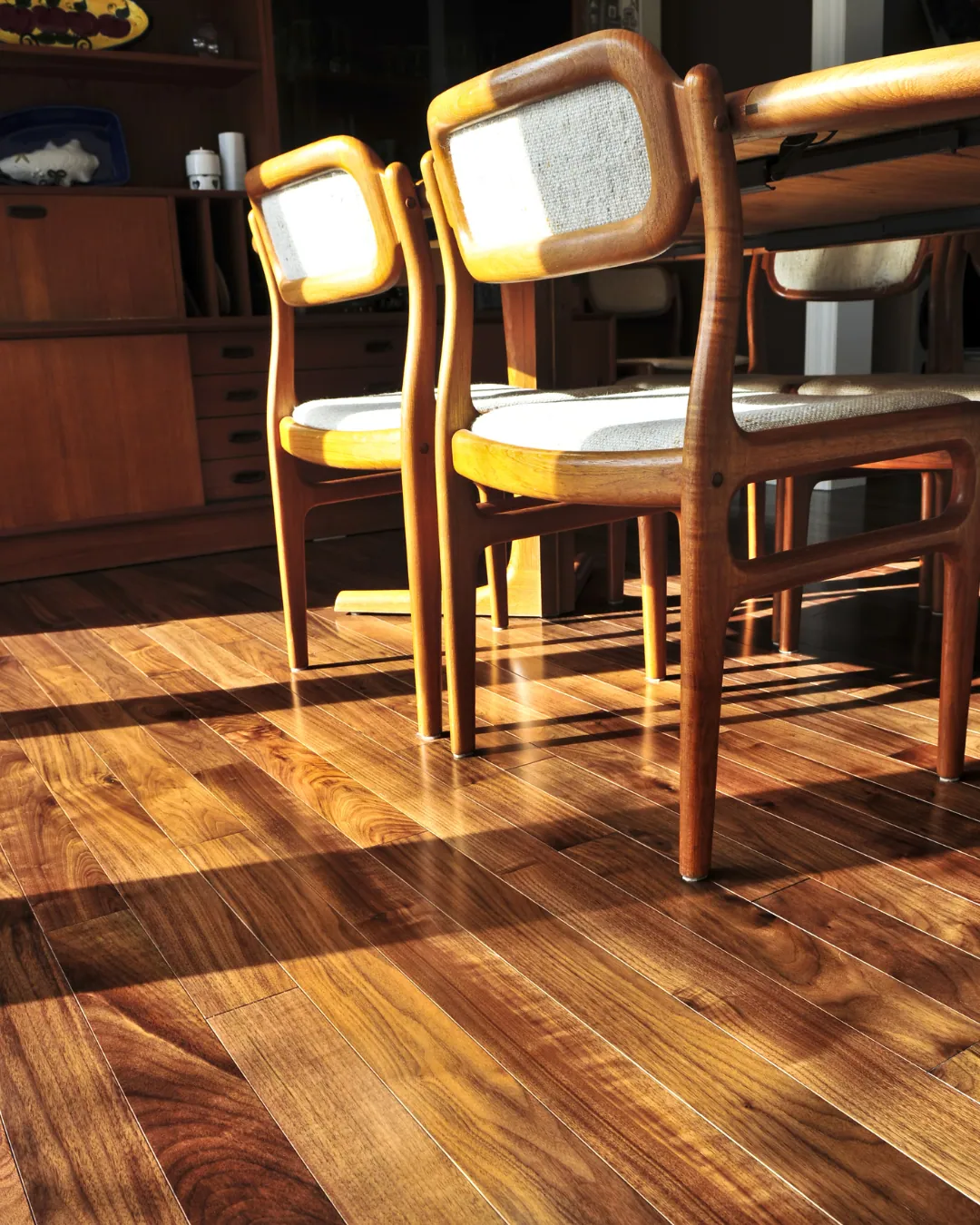 Engineered hardwood lit by afternoon sun