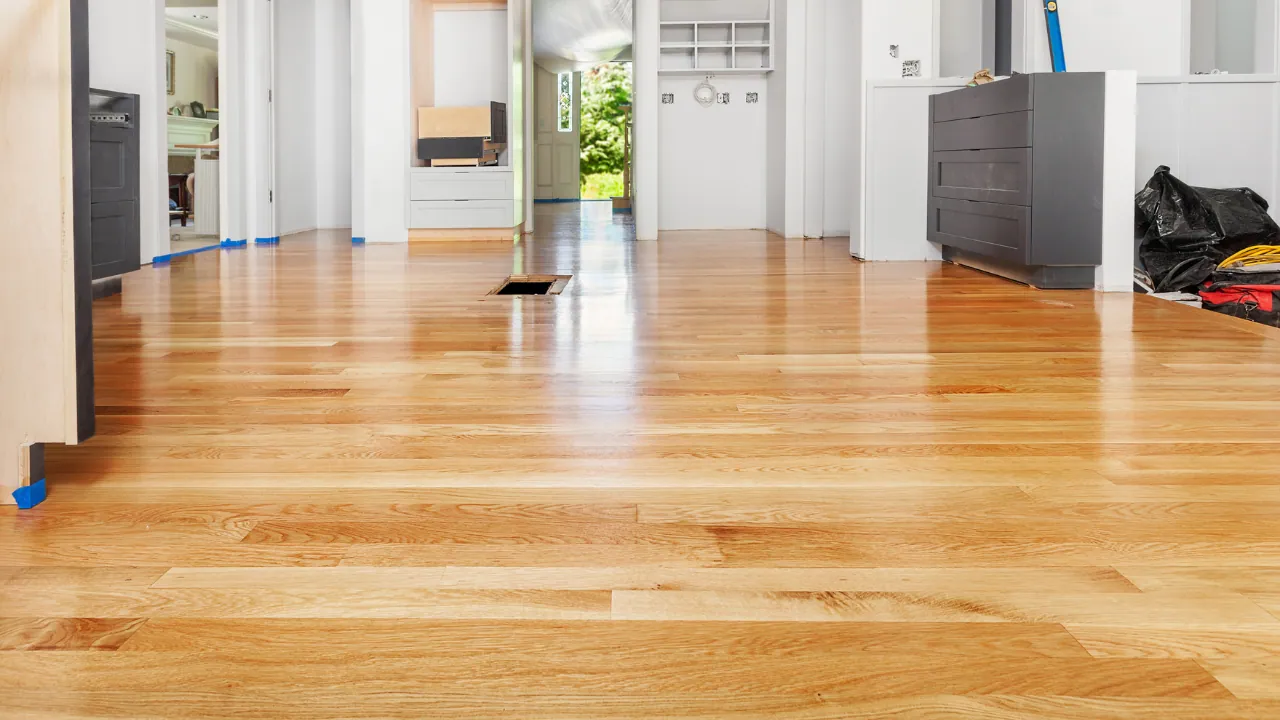 TFPros installer fitting hardwood planks