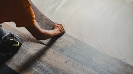 TFPros crew installing click-lock laminate planks