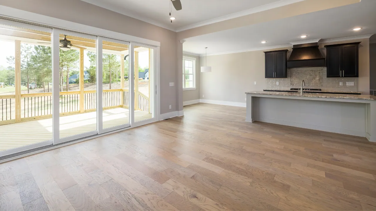 Laminate transitioning to vinyl in a hallway