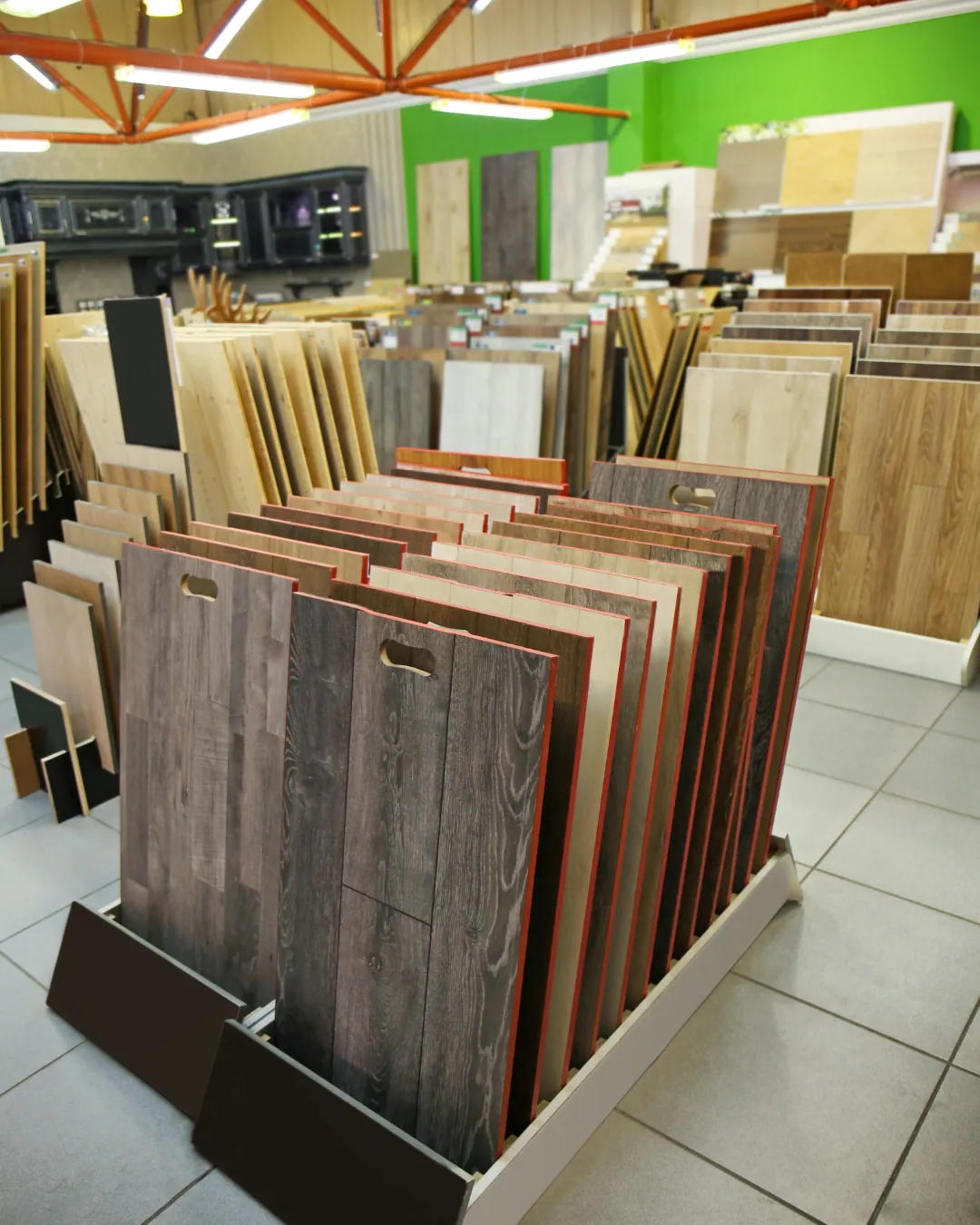 Detailed flooring installation quote on a clipboard with carpet and LVP samples