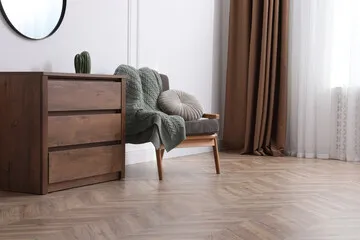 Luxury vinyl flooring framing a quiet reading nook in an Avon, IN home